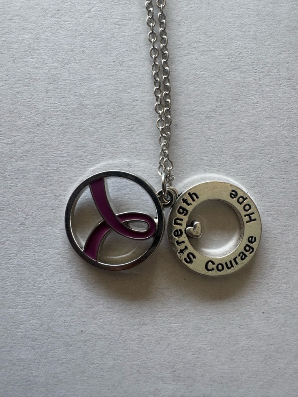 Silver Support Ribbon Pendant Necklace with Pink Accent